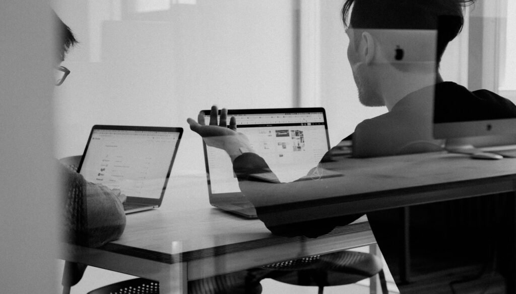 Marketing team reviewing brand mentions in AI chat responses