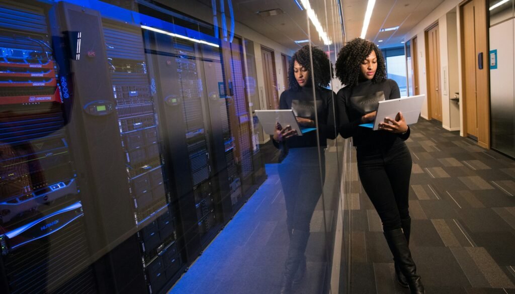 Marketer building an automated email sequence on a laptop